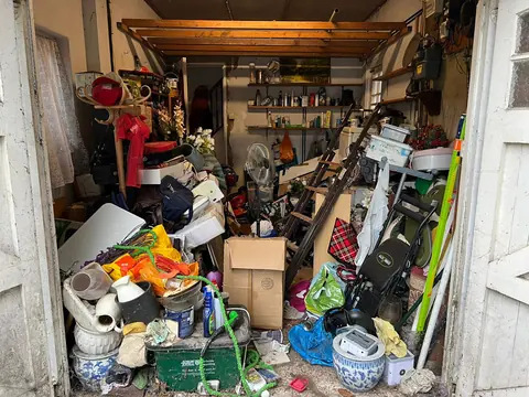 Domestic garage clearance in Banstead — before clearance